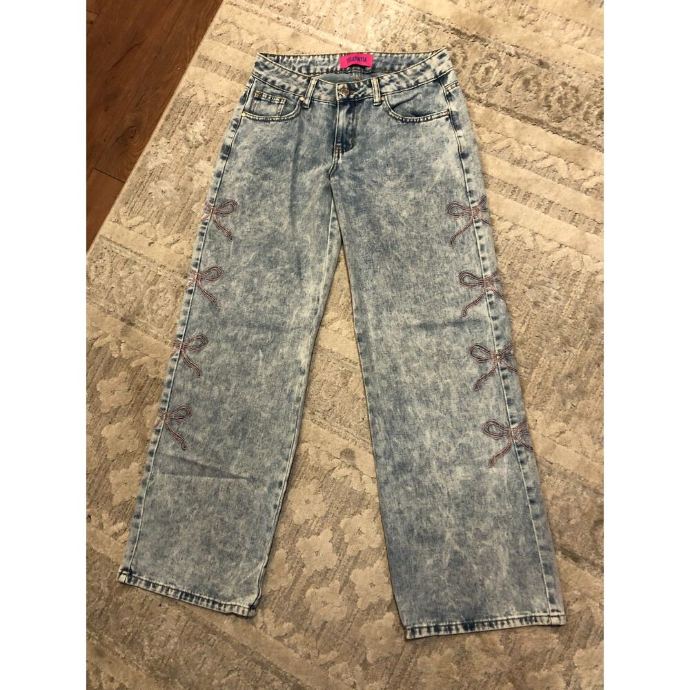 Woman's Distressed Jean With Bows On Side Size 26